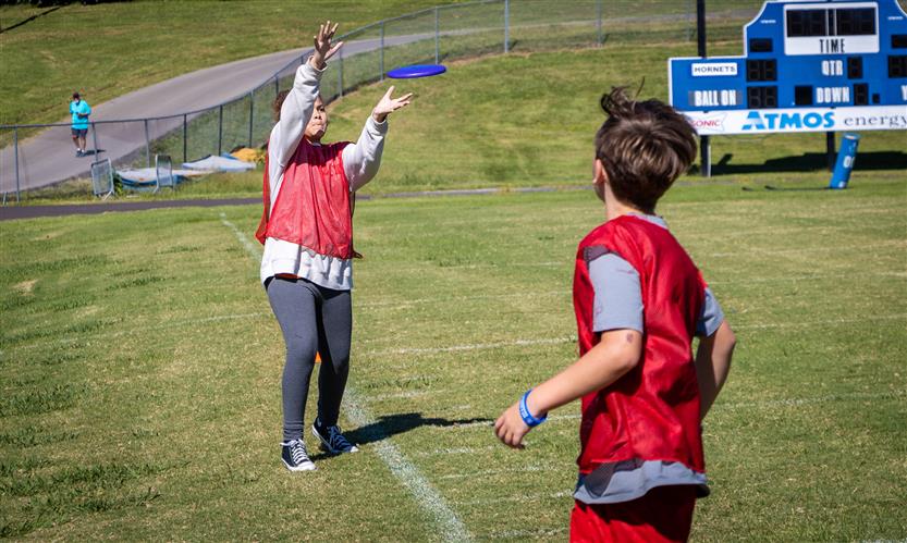 Students play ultimate frisbee